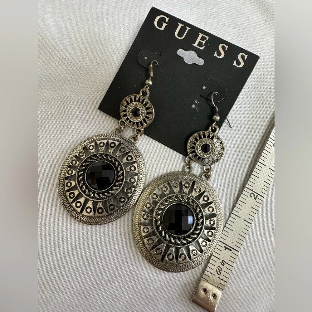 Industrial vibe Guess silvertone dangle earrings